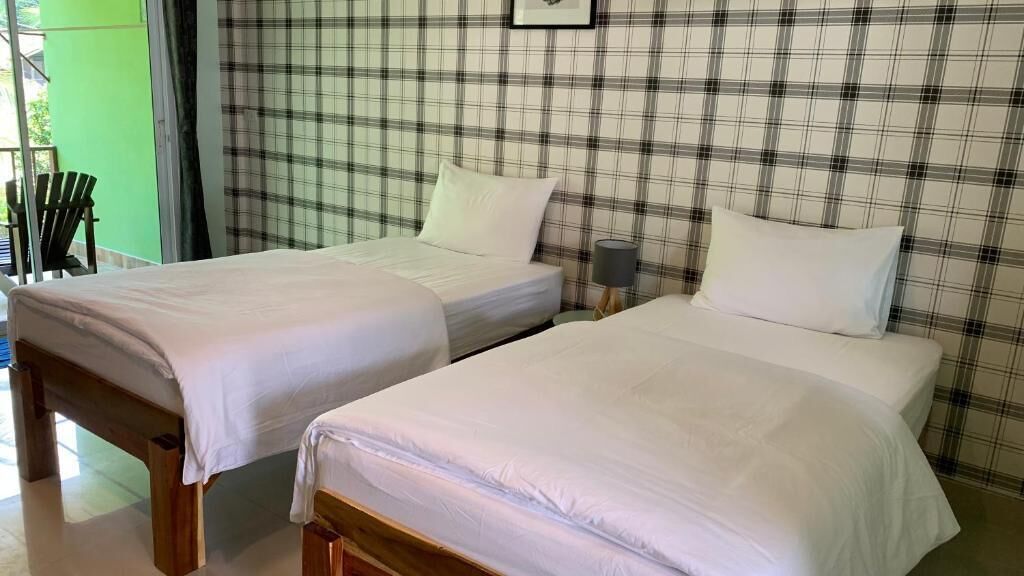 Standard Twin Room, Lanai, Garden View | Blackout curtains, free WiFi