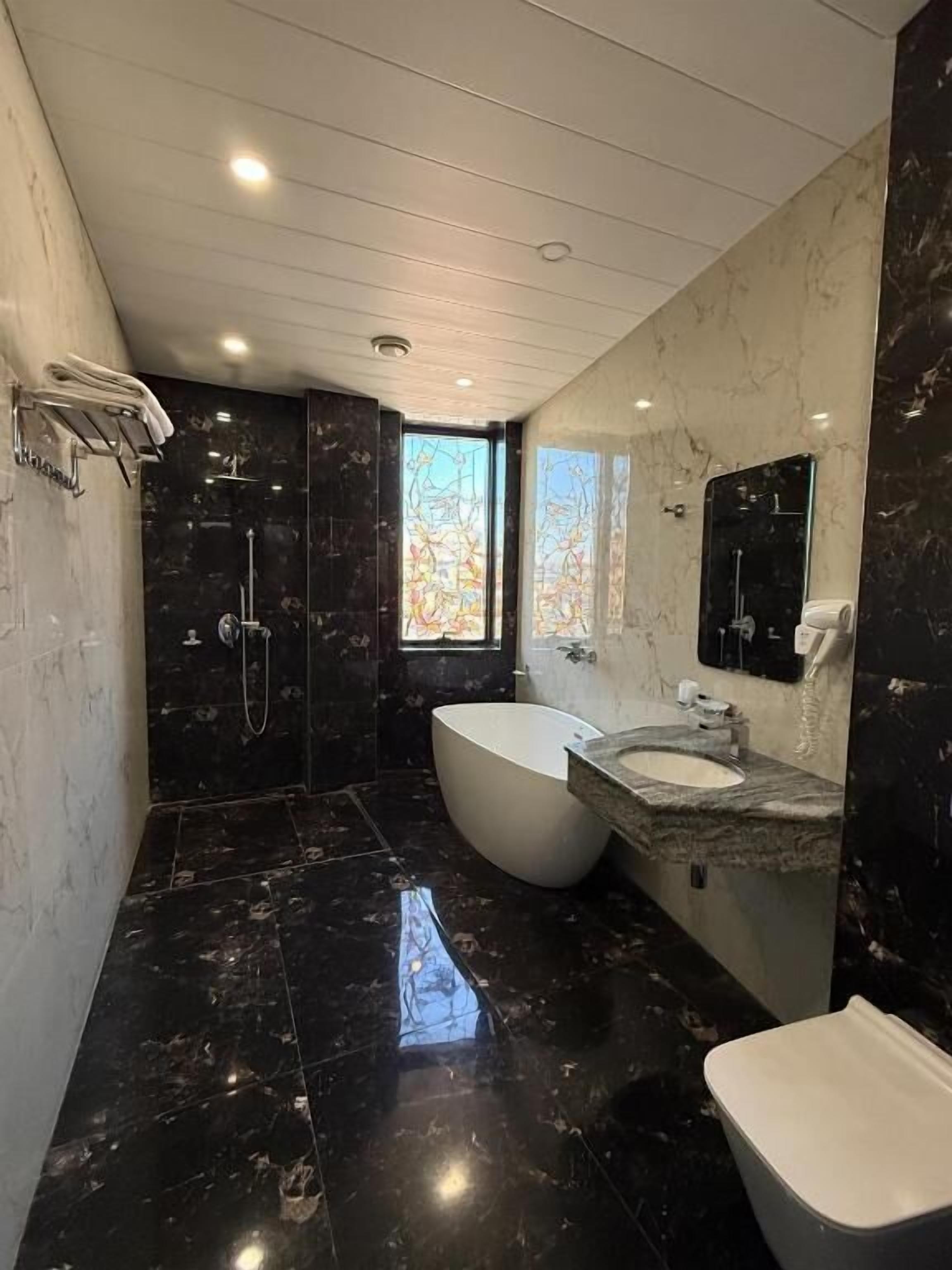 Double Room, City View | Bathroom | Free toiletries, hair dryer, towels, soap