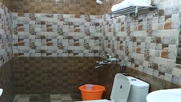 Shower, rainfall showerhead, towels, soap