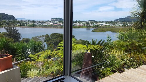 Panoramic Position: Iconic Whangamata Private 4 bedroom with indoor/outdoor flow