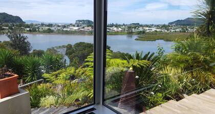 Panoramic Position: Iconic Whangamata Private 4 bedroom with indoor/outdoor flow