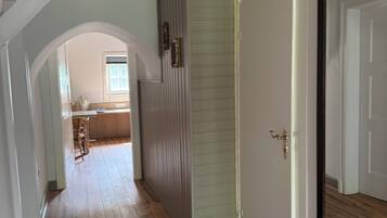 Apartment, Garden View | Desk, laptop workspace, blackout drapes, WiFi (free)