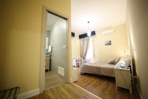 Habitación doble, vistas a la ciudad | Cortinas opacas y sistema de insonorización
