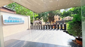 The entrance of the Imperial Tamanna Hotel with a tiled floor and a signboard. - Imperial Tamanna Hotel  (Pimpri-Chinchwad)
