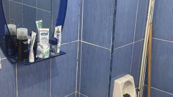 Bidet, towels, soap, toilet paper