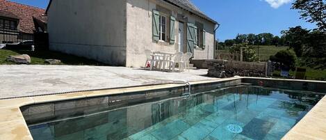 Piscina all'aperto, una piscina riscaldata