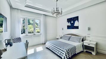 Junior Suite, Balcony, City View | In-room safe, desk, iron/ironing board, free WiFi