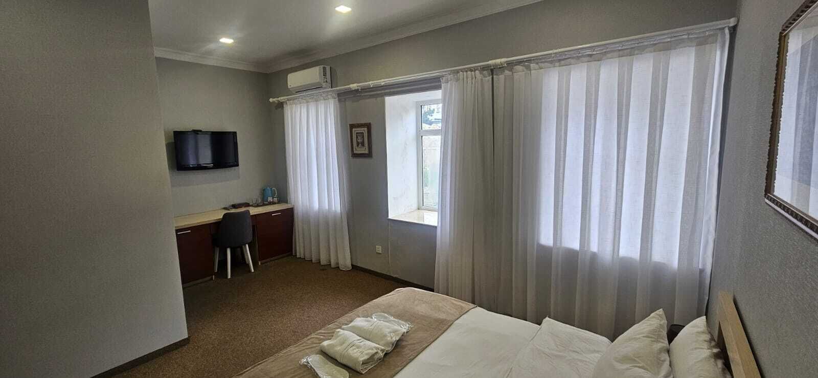 Superior Double Room, City View | Desk, laptop workspace, iron/ironing board, free WiFi
