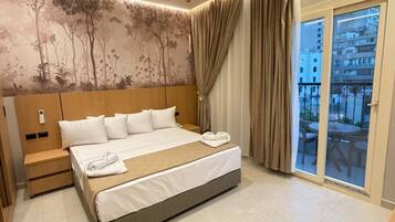 Deluxe Double Room, City View | In-room safe, desk, free WiFi