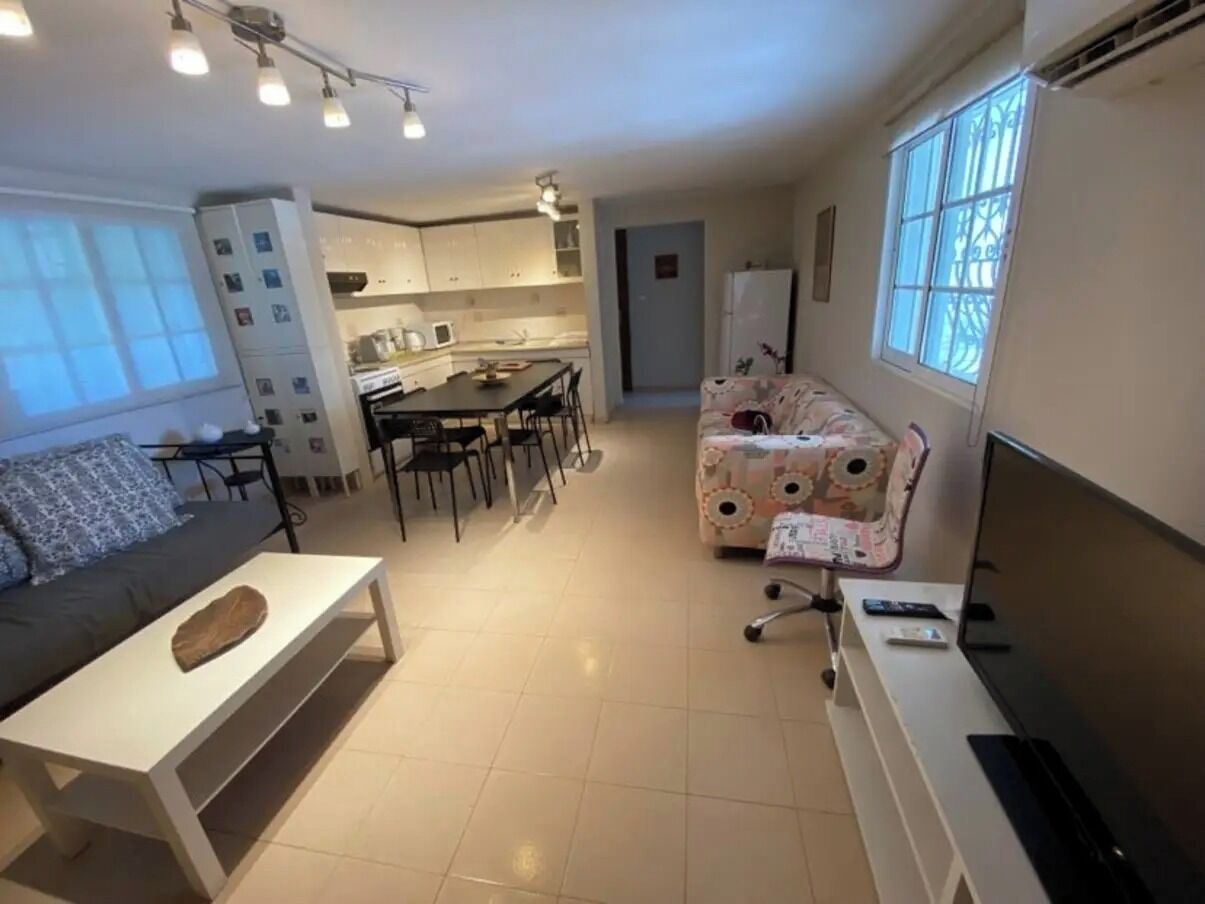 Apartment, 2 Bedrooms, Balcony, Garden View | Living area | Books