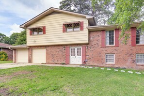 A two-story house with a garage, brick exterior, and a front lawn. - Near Southern Regional MC! Commuter-friendly Base (Riverdale)