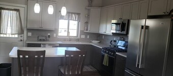 6 miles from Sturgis
Peaceful newer home sleeps 10 and double car garage parking