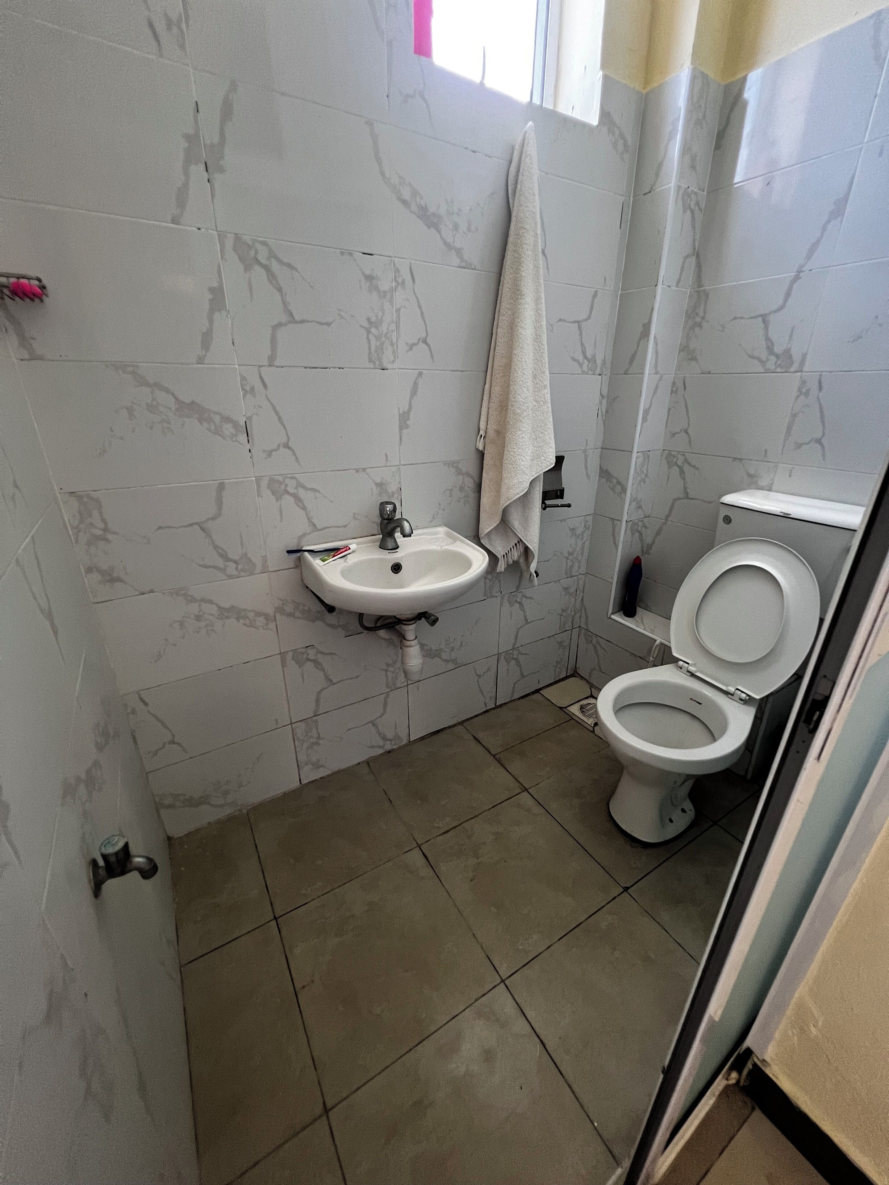 Shower, towels, soap, toilet paper