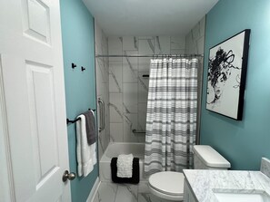 Hair dryer, towels, soap, shampoo