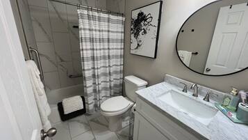 Hair dryer, towels, soap, toilet paper