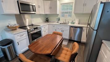 Coffee/tea maker, fridge, microwave, oven