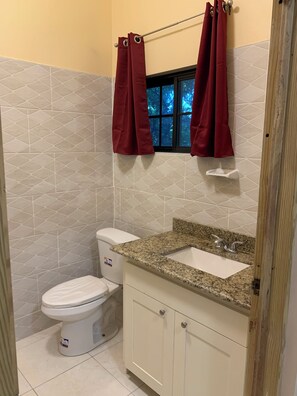 Shower, towels, soap, toilet paper - The Perfect Studio with AC,  Wifi, Internet in the awesome community Duncan Bay. (Duncans)