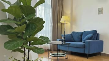 Departamento superior, 1 habitación, para no fumadores, cocina | Área de sala de estar | Smart TV de 45 pulgadas con canales digitales y Netflix