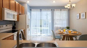 Private kitchen - Modern Townhome Minutes to Disney • Pool (Kissimmee)
