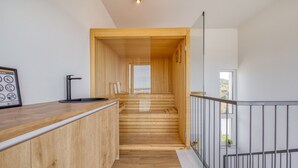 A wooden staircase leading to a higher floor, a reception desk, and a window with a view. - Villa Flokica with Heated Pool (Maslenica)