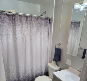 Hair dryer, towels, soap, toilet paper
