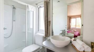 Hair dryer, towels, soap, toilet paper