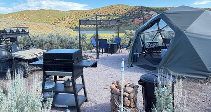 Unplug and unwind in our secluded off-grid glamping dome, nestled by a private lake. Enjoy the peace and quiet with all the comforts of home