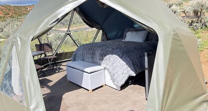 Unplug and unwind in our secluded off-grid glamping dome, nestled by a private lake. Enjoy the peace and quiet with all the comforts of home