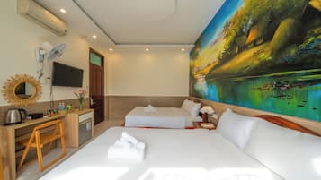 Habitación cuádruple estándar, no fumadores, vistas al jardín | Minibar, wifi gratis, ropa de cama
