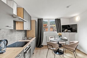 Apartamento conforto, 1 cama Queen e sofá-cama | Cozinha privada