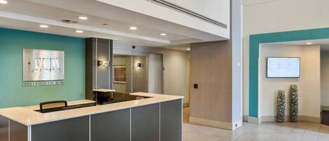 Welcome to a beautifully designed lobby that offers a blend of comfort and elegance.