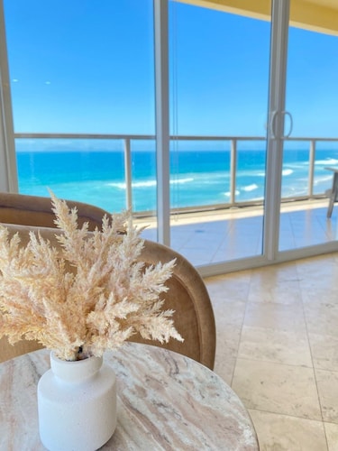 Beachfront Penthouse with Large Private Rooftop Patio with Wood Burning Firepit