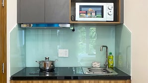 スーペリア アパートメント 1 ベッドルーム バルコニー パークビュー | 専用キッチン | 冷蔵庫、電子レンジ、コンロ、調理器具と食器
