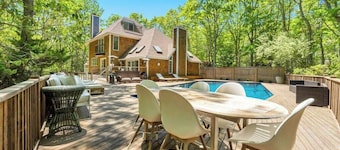 Stunning shingled Water Mill estate featuring a private heated pool and...