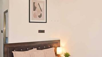Deluxe Twin Room, Garden View | In-room safe, desk, laptop workspace, free WiFi
