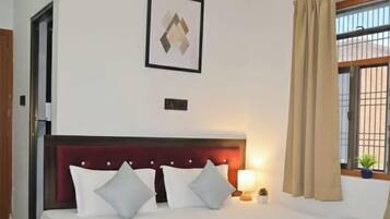 Deluxe Double or Twin Room, Garden View | In-room safe, desk, laptop workspace, free WiFi