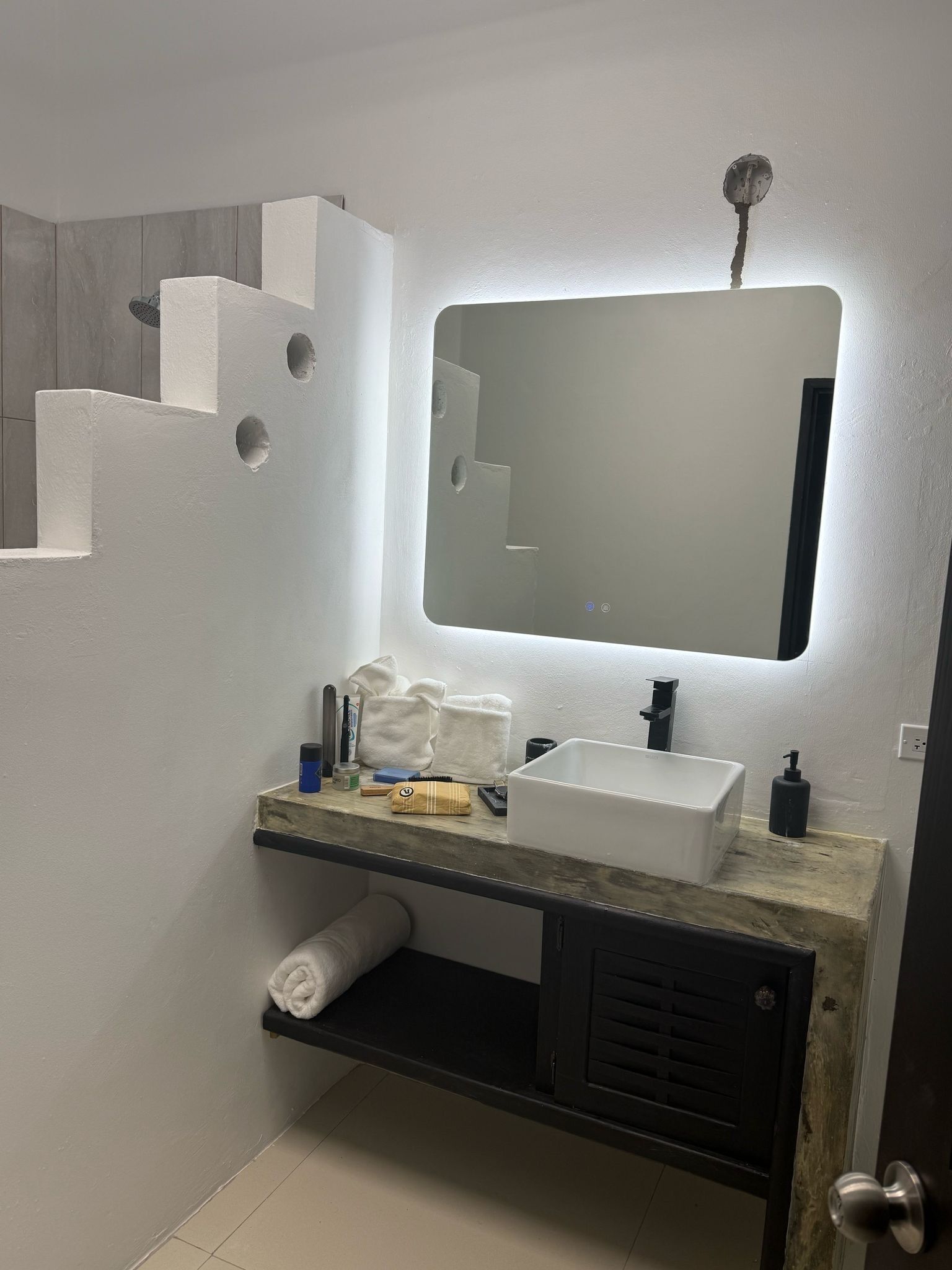 Shower, towels, soap, toilet paper