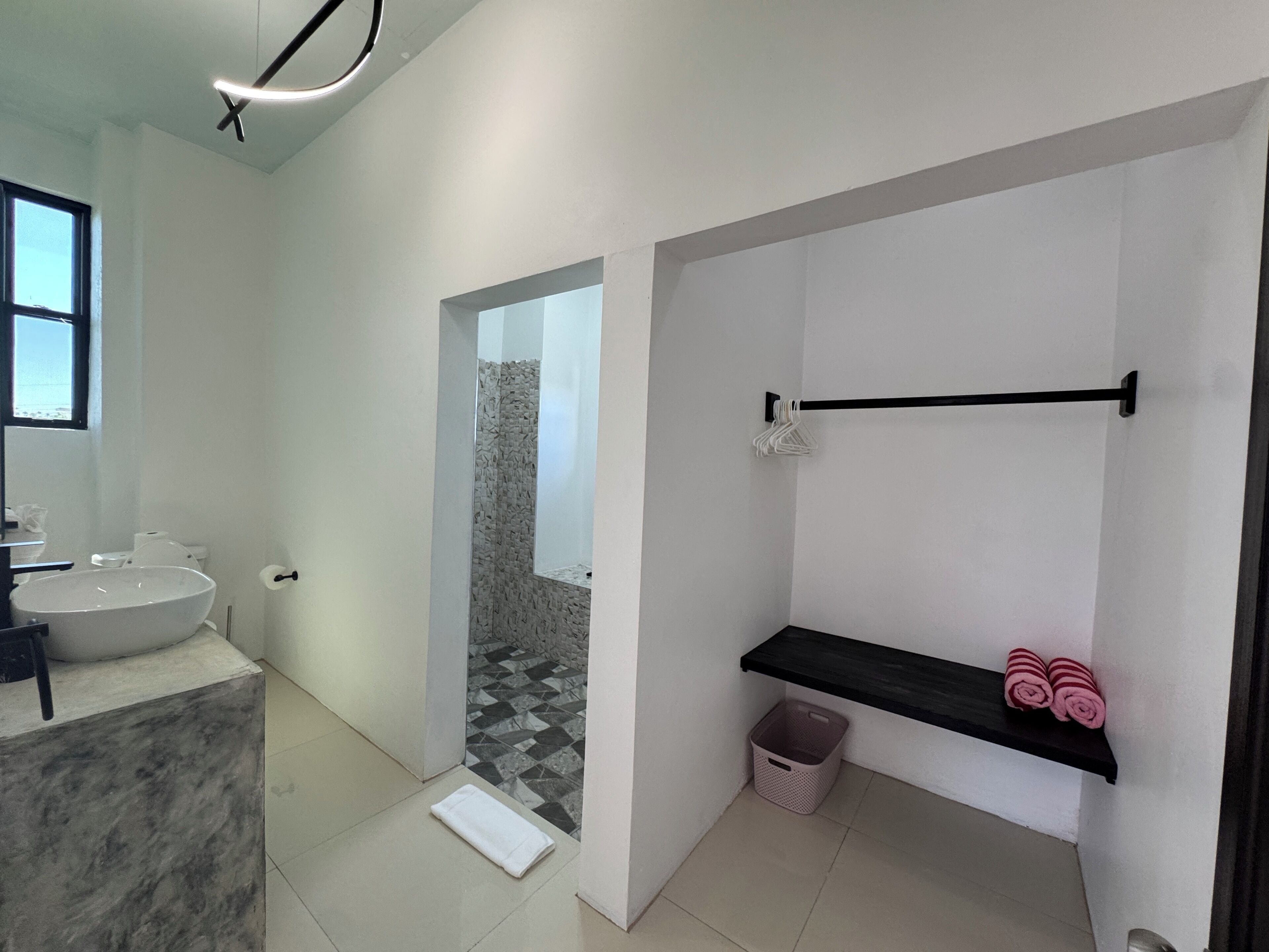 Shower, towels, soap, toilet paper