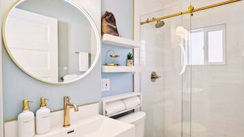 Shower, hair dryer, towels, soap