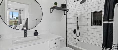 Hair dryer, towels, soap, shampoo