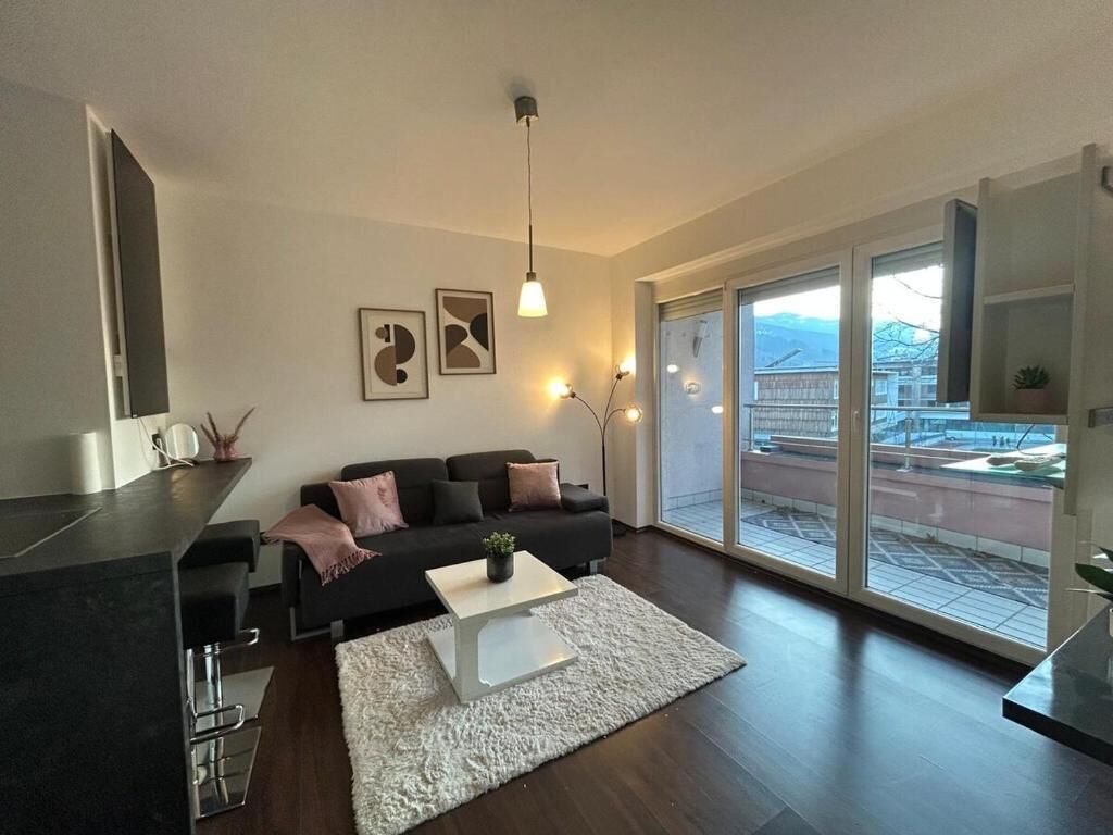 Apartamento conforto, 1 cama de casal e sofá-cama, sacada | Área de estar