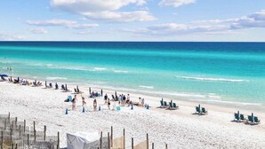 A beach with clear turquoise water, white sand, and a wooden fence in the foreground. - ~Villa Blanca~ Rooftop! Best Location on 30A~Alys~Seacrest~Rosemary Beach (Panama City)