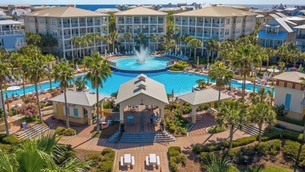 A resort with a central pool, multiple buildings, and palm trees. - ~Villa Blanca~ Rooftop! Best Location on 30A~Alys~Seacrest~Rosemary Beach (Panama City)