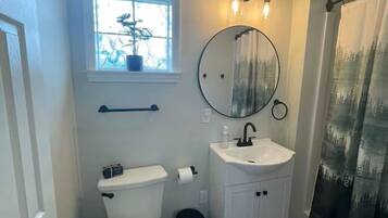 Hair dryer, towels, soap, toilet paper