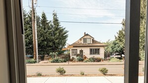 A residential house with a front yard, a sidewalk, and a street view. - New Sequim Condo Near Olympic Discovery Trail, Golf & Lavender Farms (Sequim)