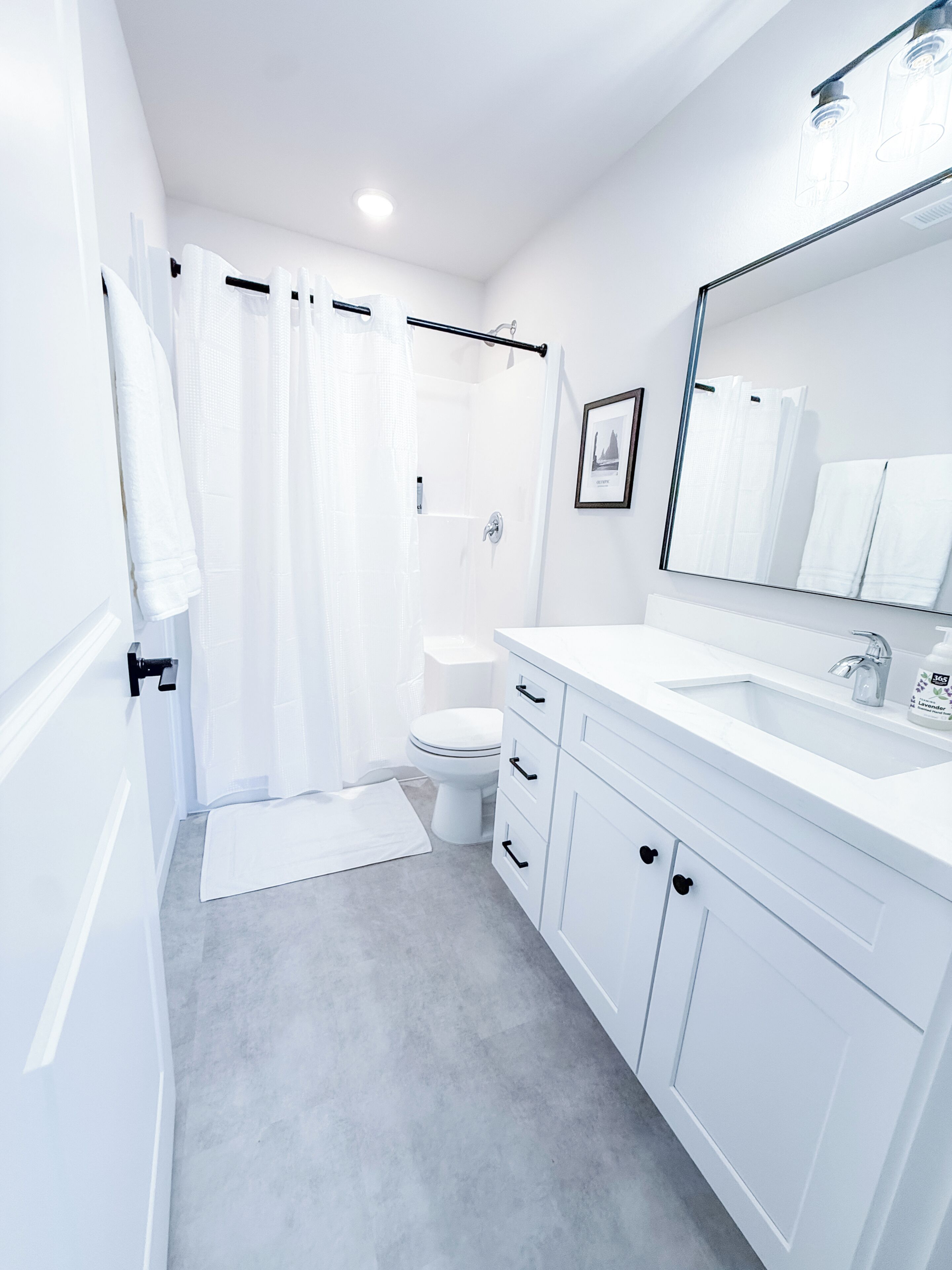 Shower, towels, soap, toilet paper