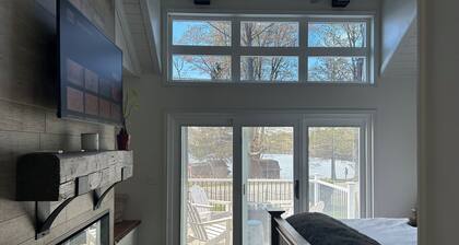Lake front retreat with hot tub and lake access. Stay and relax and enjoy.
