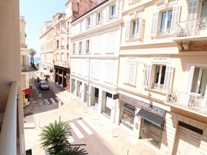 A street view with buildings, a crosswalk, and a Harley's motorcycle shop. - 2 bedroom Croisette Monod 348 by Interhome (Cannes)