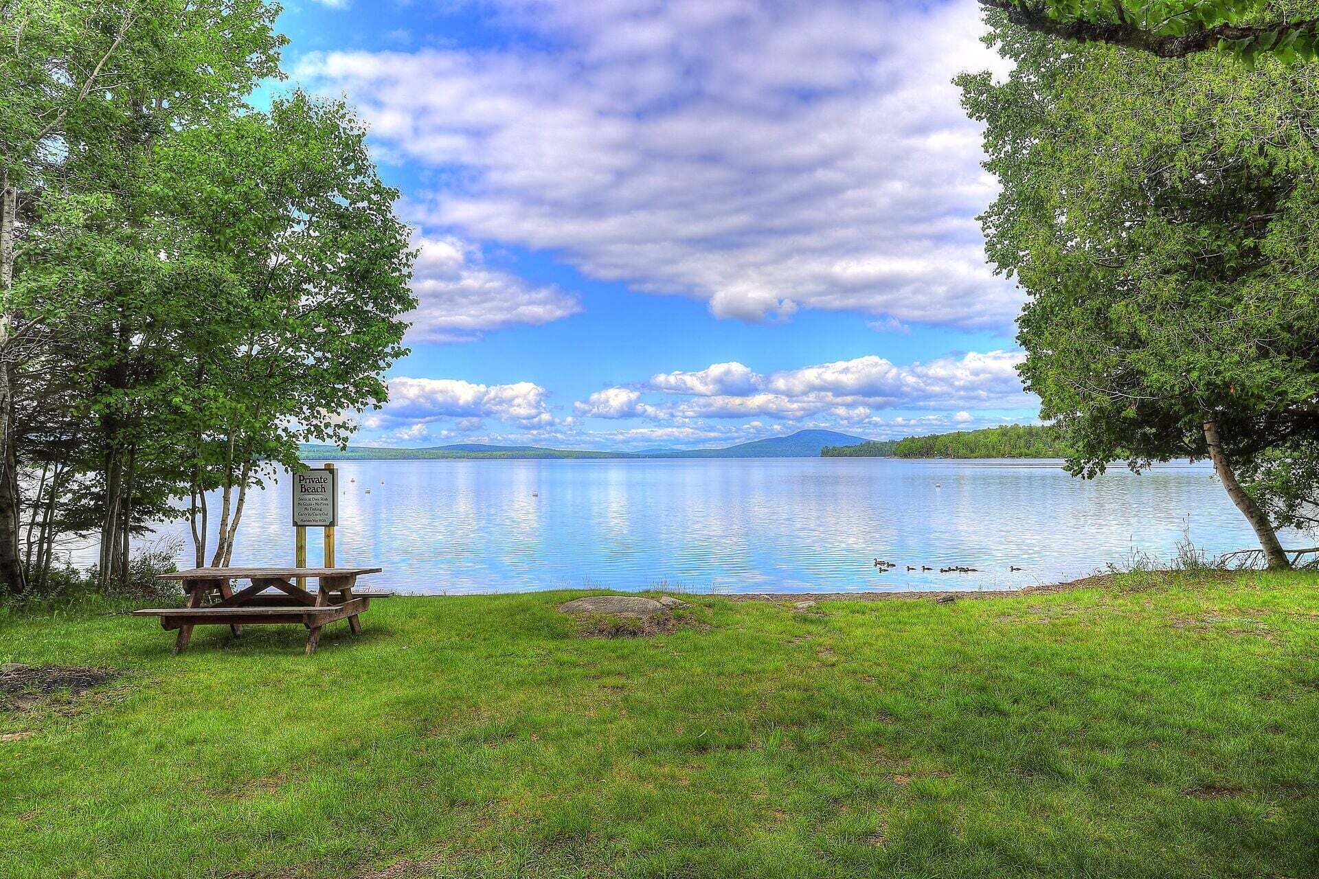 Shared waterfront on Rangeley Lake within walking distance!