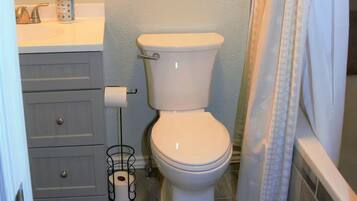 Jetted bath, hair dryer, towels, soap